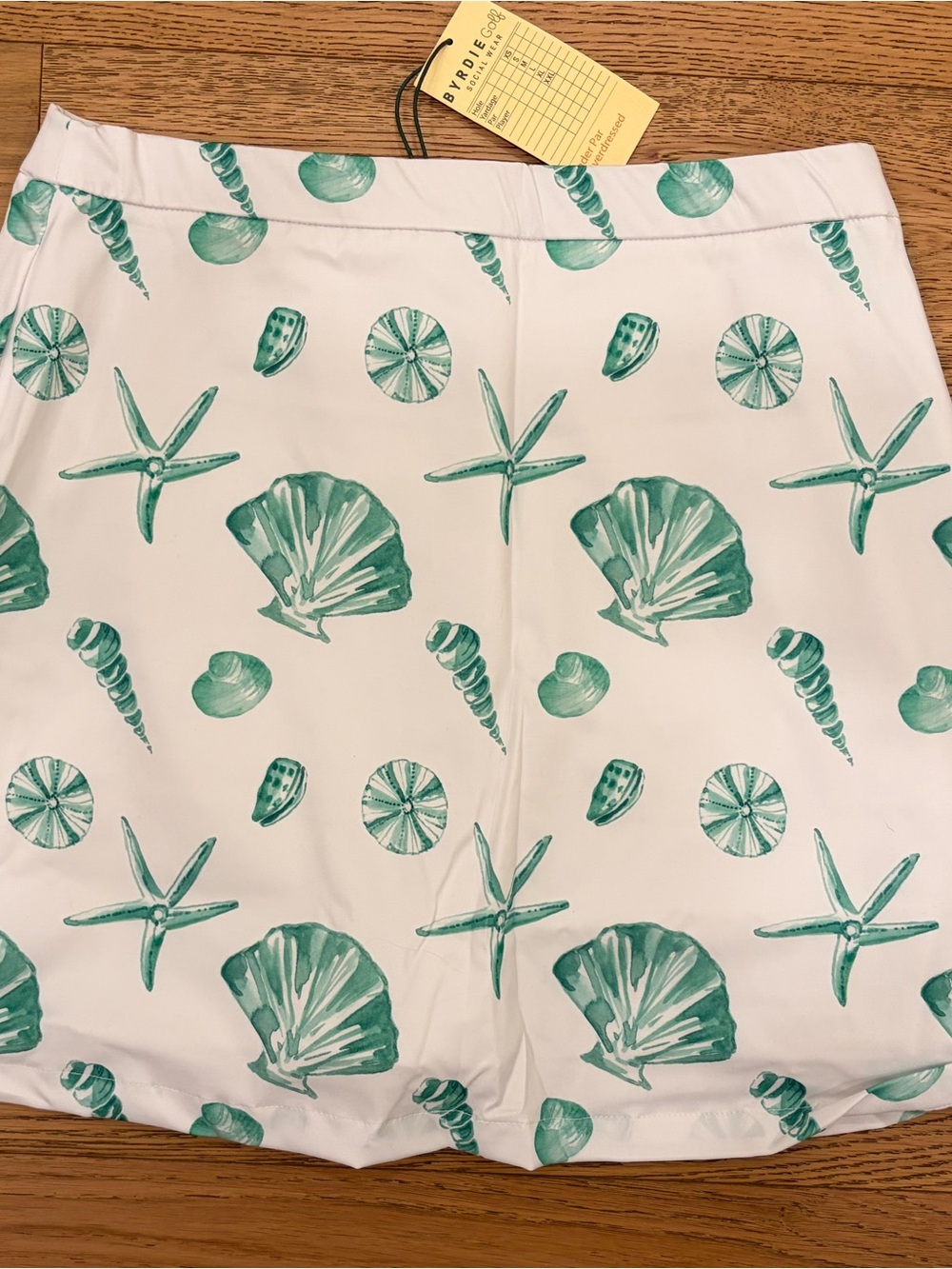 NWT Women’s Byrdie Golf Social Wear White Skort with Green Seashell Print size L